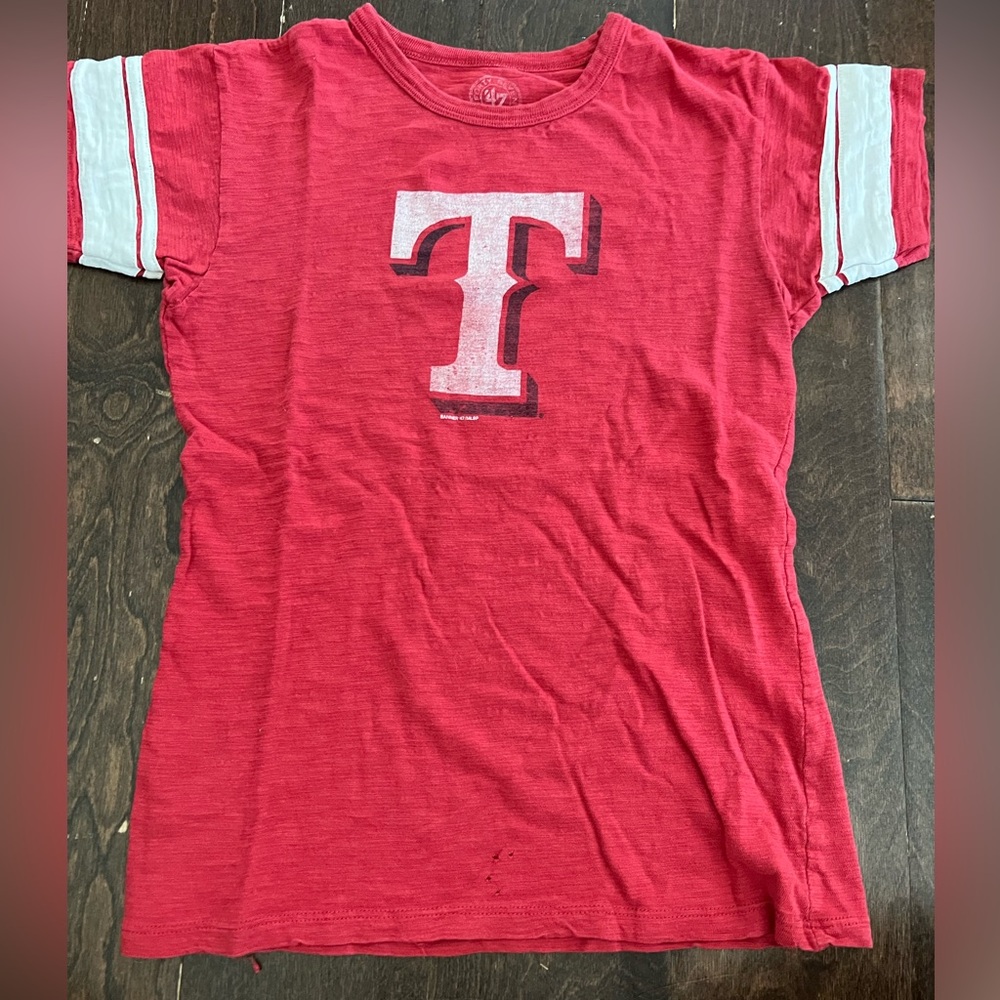 Women’s small forty-seven Texas Rangers shirt - small holes in front bottom